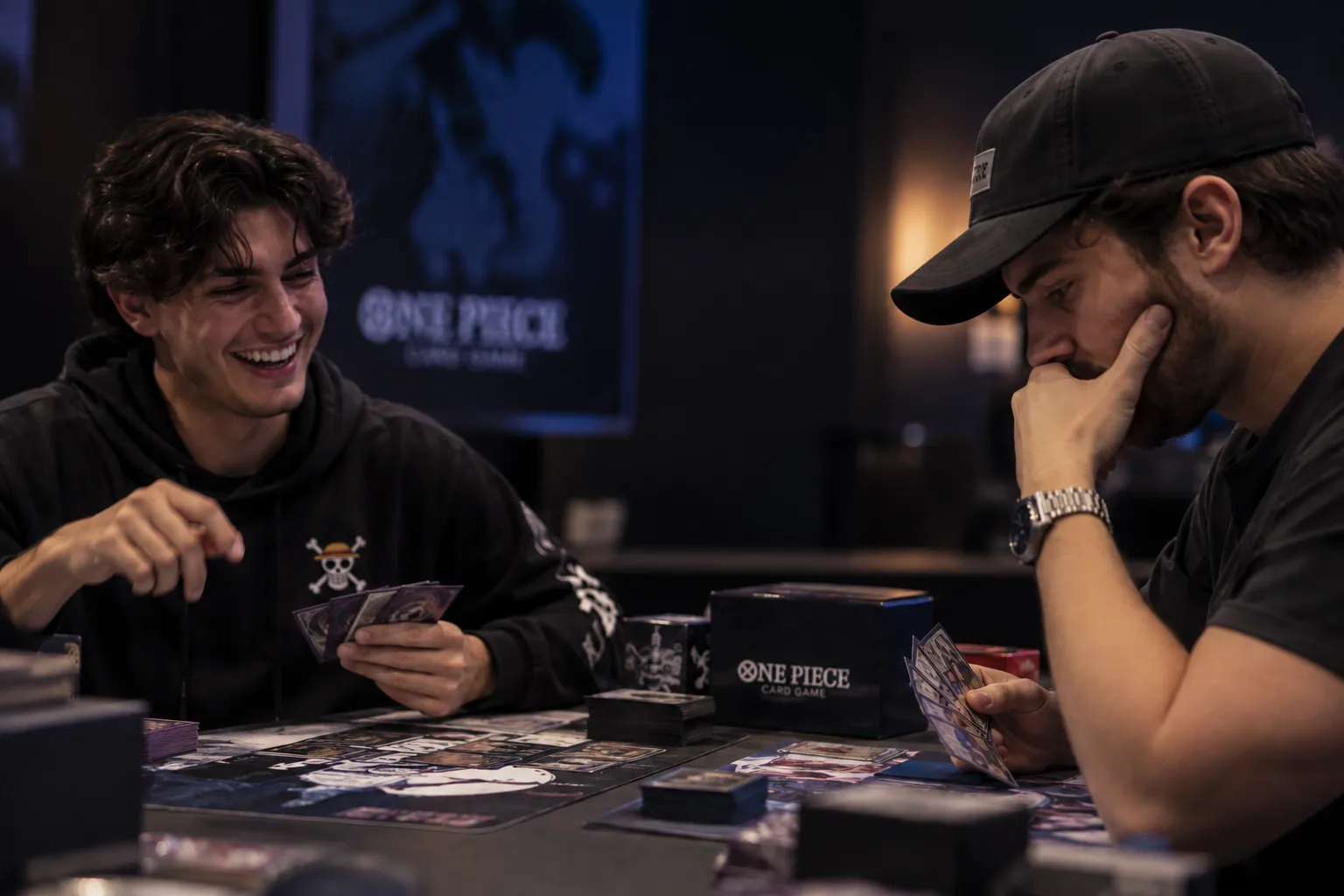 Two players in a One Piece Card Game match